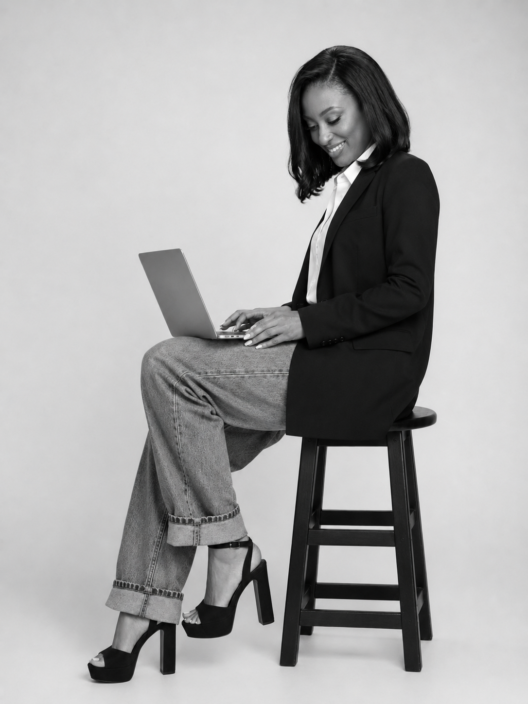 Shiloh Moyo working on a laptop
