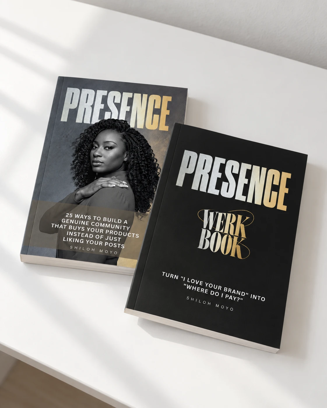 Presence and the black Presence Werkbook displayed together on a sunlit table